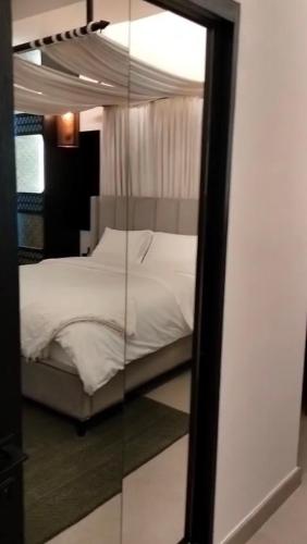 Ένα ή περισσότερα κρεβάτια σε δωμάτιο στο Tranquil Stay