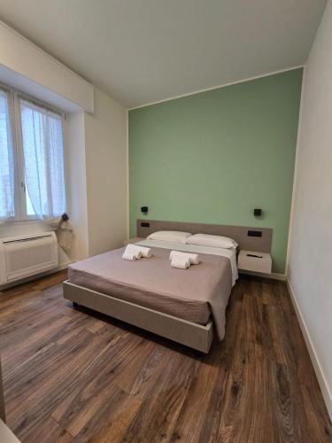 Ένα ή περισσότερα κρεβάτια σε δωμάτιο στο VeronaVera Orlandi