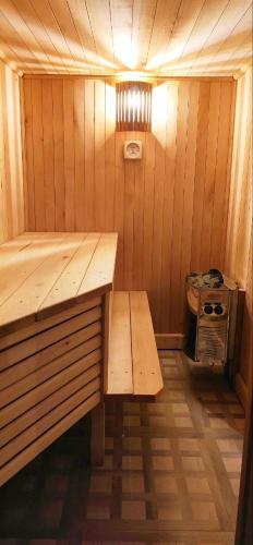 a small room with a bench and a stove at Boka 2 in Krašići
