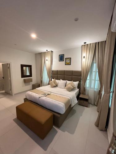 Ένα ή περισσότερα κρεβάτια σε δωμάτιο στο Sweet Homes Apartment