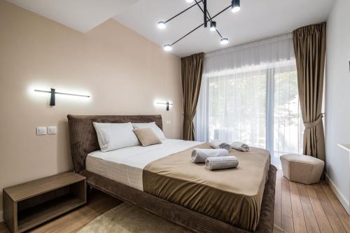 Ένα ή περισσότερα κρεβάτια σε δωμάτιο στο Newly Modern Designed 1BR Apartment