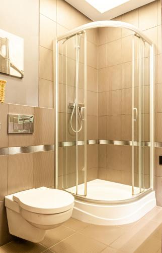 Foto Home & Travel Apartamenty w centrum Łodzi - Piotrkowska - Klimatyzacja - Parking - Manufaktura - OFF Piotrkowska - EC1 - ATLAS Arena - Orientarium - Monopolis 3