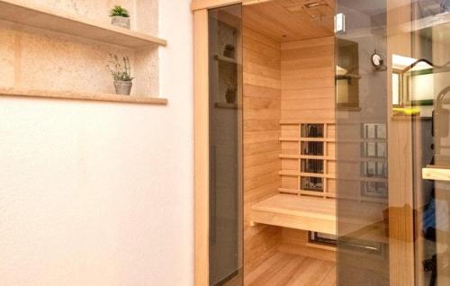 a room with a glass door leading into a room at Villa Monteneze by Villas Guide in Zagvozd