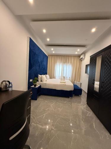 Ένα ή περισσότερα κρεβάτια σε δωμάτιο στο Hôtel Phoenicia