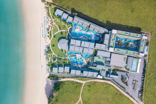 an aerial view of a resort by the water at Le Meridien Khao Lak Resort & Spa in Khao Lak