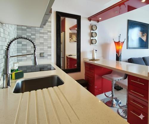 a kitchen with a sink and a counter top at Casa Cuba in Morro del Jable