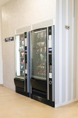 two vending machines are in a store at Park Hotel Porto Gaia in Vila Nova de Gaia