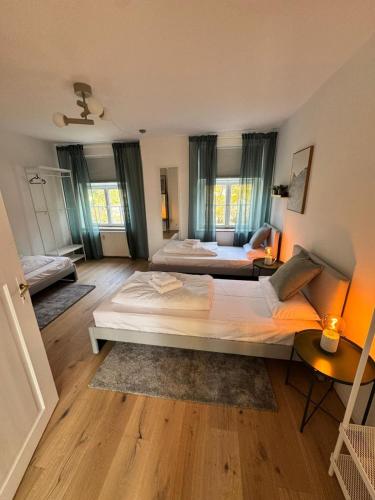 Postel nebo postele na pokoji v ubytování Bavaria Home Apartments Geisenfeld