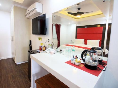 Kuhinja ili čajna kuhinja u objektu Manarra Sea View Resort