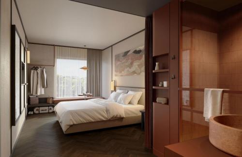 Ένα ή περισσότερα κρεβάτια σε δωμάτιο στο Hotel Schani City