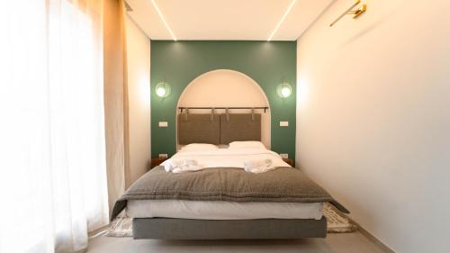 Ένα ή περισσότερα κρεβάτια σε δωμάτιο στο Aurora La Marsa 201 – Modernité Charme