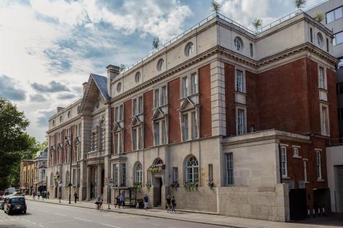 a large brick building on the side of a street at Courthouse Hotel Shoreditch in London