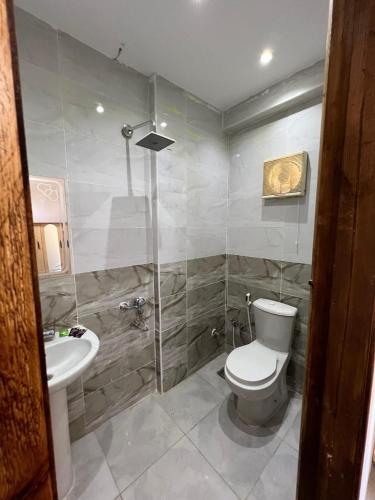 Koupelna v ubytování La casa hotel