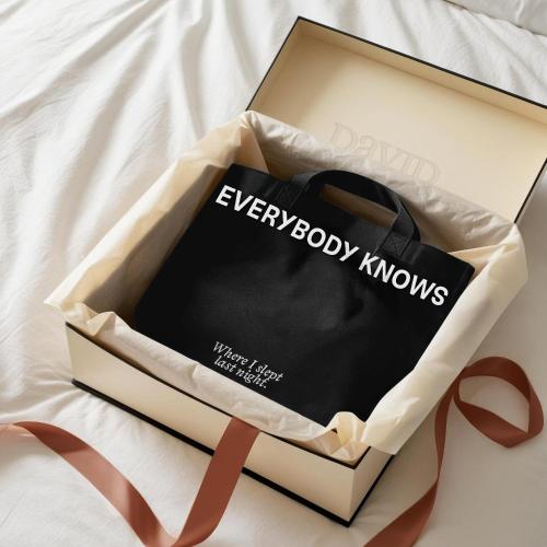 a box with a book and a pair of scissors at David Hotel in Montreal