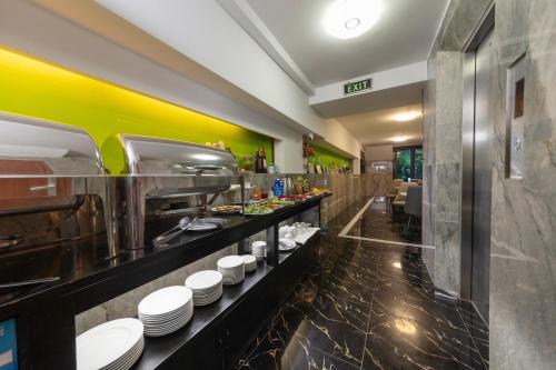 Nhà bếp/bếp nhỏ tại Eclipse Legend Hotel