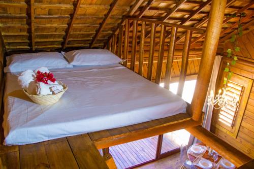 Postel nebo postele na pokoji v ubytování Chalet Paraiso Canoa 3 na praia - Canoa Quebrada