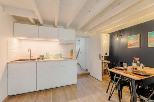 Η κουζίνα ή μικρή κουζίνα στο La loge premium - Bouscat au pied du tram