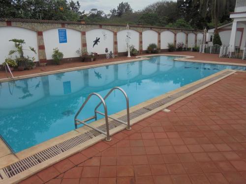 a swimming pool at the hotel at Villa Leone Boutique Hotel in Nairobi