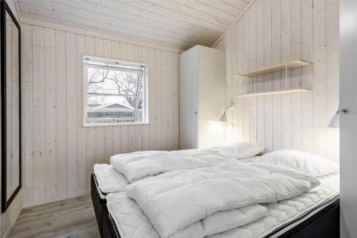 Postel nebo postele na pokoji v ubytování Modern beach summerhouse