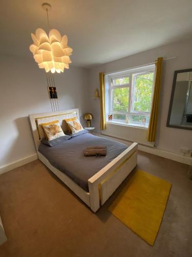 Ένα ή περισσότερα κρεβάτια σε δωμάτιο στο 18K HOME FROM HOME