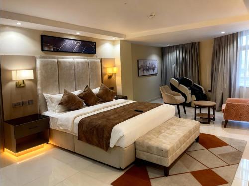 Ένα ή περισσότερα κρεβάτια σε δωμάτιο στο Villa Park Hotel Abuja