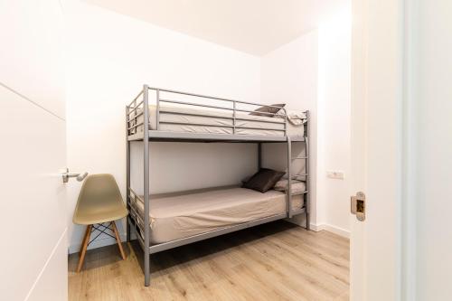 Кровать или кровати в номере Global Immo 3395 Sylvia 1M