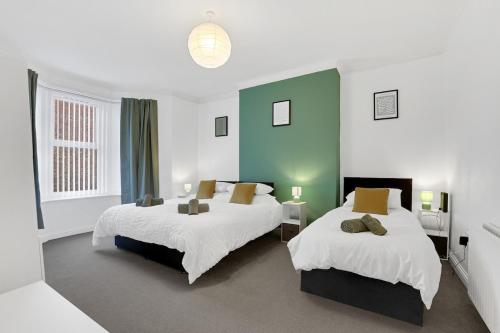 Postel nebo postele na pokoji v ubytování Valley View Apartment