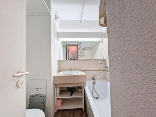 a small bathroom with a sink and a toilet at Studio cosy à Val-d'Isère, 4 pers, balcon, cuisine équipée - FR-1-518-157 in Val dʼIsère