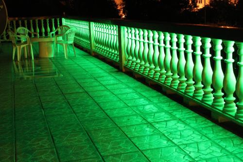 a deck with green lights on it at Arkady in Słupsk