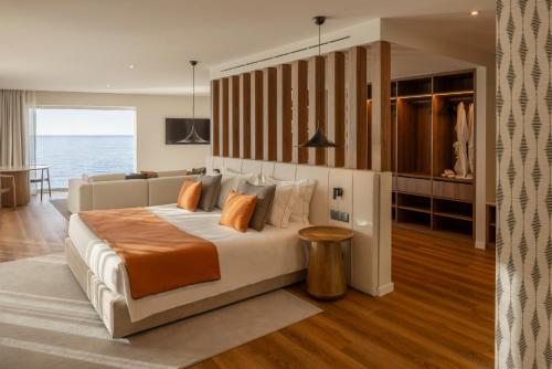 Ένα ή περισσότερα κρεβάτια σε δωμάτιο στο Arribas Sintra Hotel