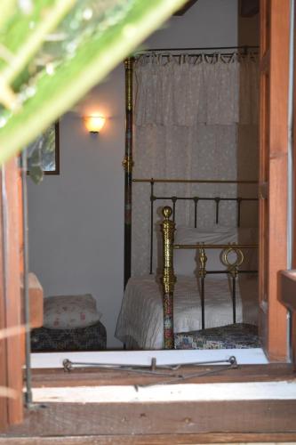 a bedroom with a bed in a room at Lasa Heights Hotel in Lasa