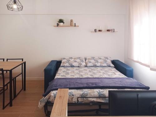 Ένα ή περισσότερα κρεβάτια σε δωμάτιο στο Playa De Las Américas - Oceanfront