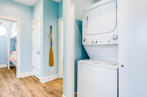a laundry room with a washer and dryer at Paradise Steps to Beach Large Deck Dog Haven in Crystal Beach