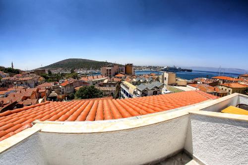 a view of a city with orange roofs at Villa Fanti in Cesme
