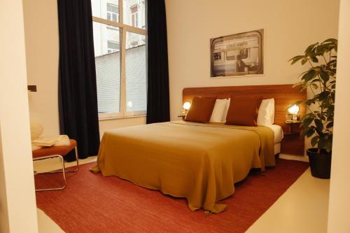 Ένα ή περισσότερα κρεβάτια σε δωμάτιο στο A Place - Boutique Hotel - Meir 24