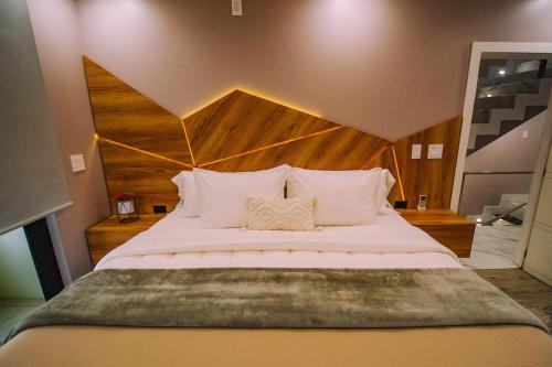 Ένα ή περισσότερα κρεβάτια σε δωμάτιο στο Luxury Casa Hojarascas in Huehuetenango