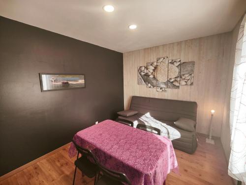 Ένα ή περισσότερα κρεβάτια σε δωμάτιο στο La Suite Soleil