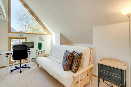 a living room with a white couch and a desk at Mtn-View Deck, Workspace! Walkable Frisco Condo in Frisco
