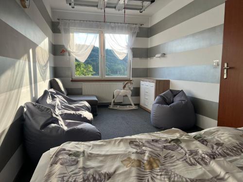 Un ou plusieurs lits dans un hébergement de l'établissement Dom nad Wisłą - pobyty rodzinne, grupowe, terapie