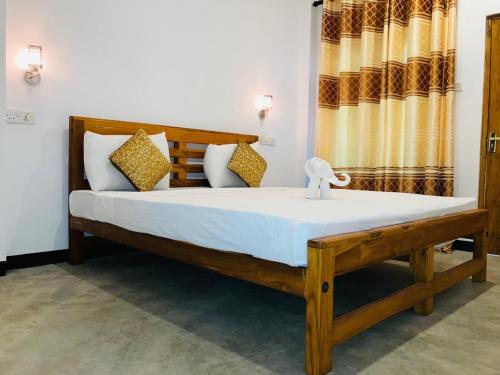 Postel nebo postele na pokoji v ubytování The river face safari resort