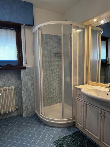 a bathroom with a shower and a sink at Mountain house Pieve di Cadore in Pieve di Cadore