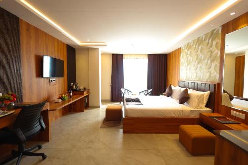 Televiisor ja/või meelelahutuskeskus majutusasutuses BK Garden Hotel and Resort