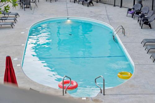 a large swimming pool with two red and yellow objects in it at Lakeview At Table Rock in Kimberling City