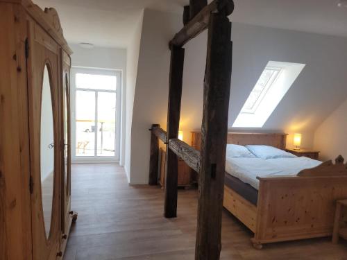 Ένα ή περισσότερα κρεβάτια σε δωμάτιο στο Heidehof Kuppendorf