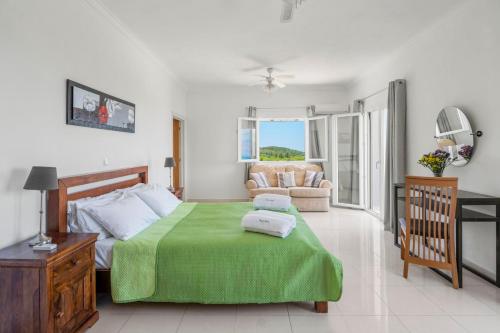 Ένα ή περισσότερα κρεβάτια σε δωμάτιο στο Panorama Julia