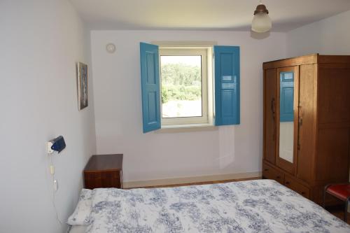 Ένα ή περισσότερα κρεβάτια σε δωμάτιο στο Casa Zinda