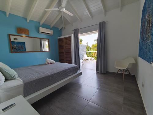 Ένα ή περισσότερα κρεβάτια σε δωμάτιο στο Villas Riviera