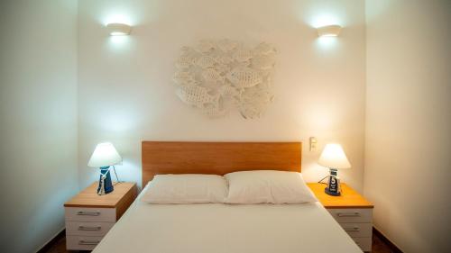 Ένα ή περισσότερα κρεβάτια σε δωμάτιο στο Uno spazio di verde incontaminato con piscina