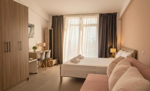 Postel nebo postele na pokoji v ubytování Elegant Dream Suites