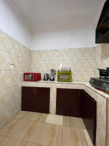 Kuchyň nebo kuchyňský kout v ubytování Ungess Luxury Serviced Apartment